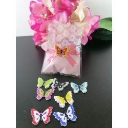 Sacchetto trasparente porta confetti con fiocchetto rosa e ricamo e con farfalla legno