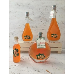 Liquore mandarinetto con oggetto in resina